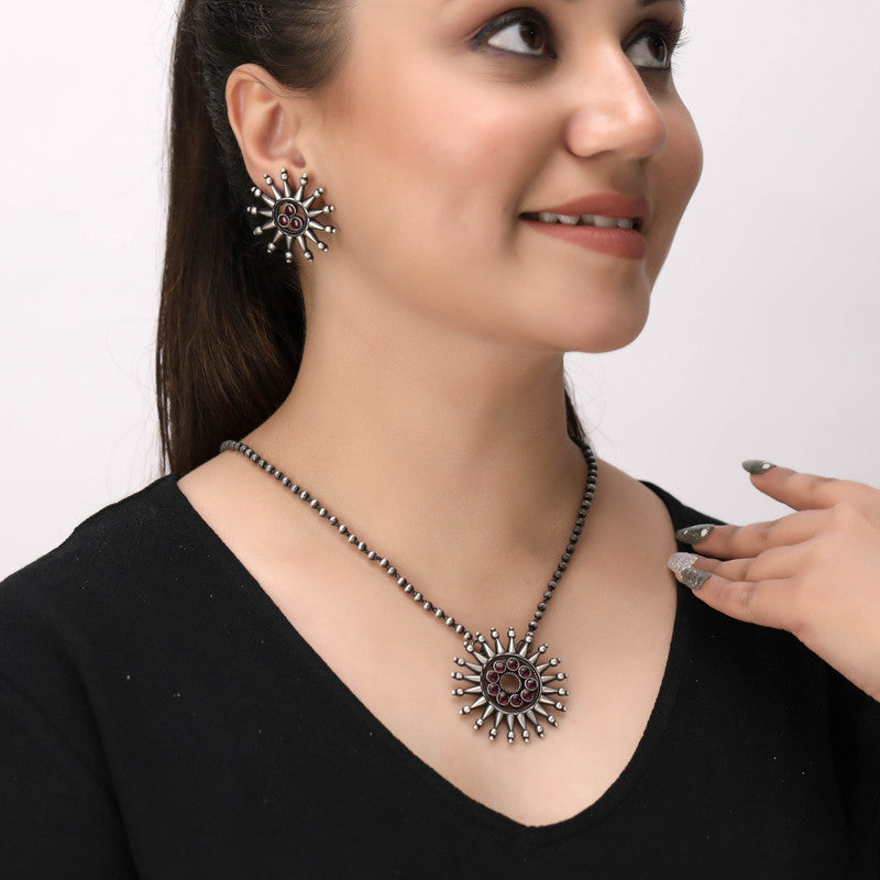 Model wearing Oxidized Silver Sun Pendant – stylish Navratri and wedding festive jewellery