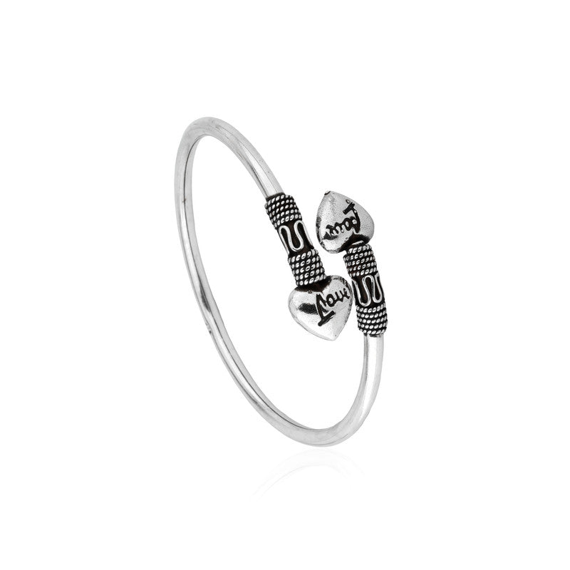 Oxidized Silver Kada with tribal heart kada on white background