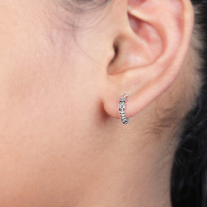 Elegant oxidized silver bali hoop earrings on model – stylish ethnic jewelry for weddings, Karwa Chauth, and cultural events