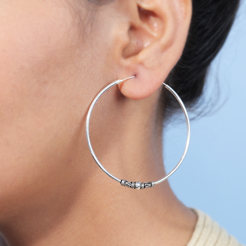 Elegant oxidized silver designer bali earrings on model – stylish ethnic hoops for weddings, Karwa Chauth, and cultural events