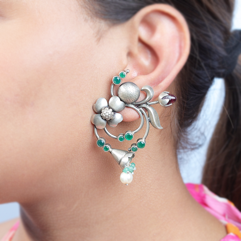 Oxidized silver lookalike earrings styled on model – elegant ethnic jewelry for weddings, parties, and festive functions