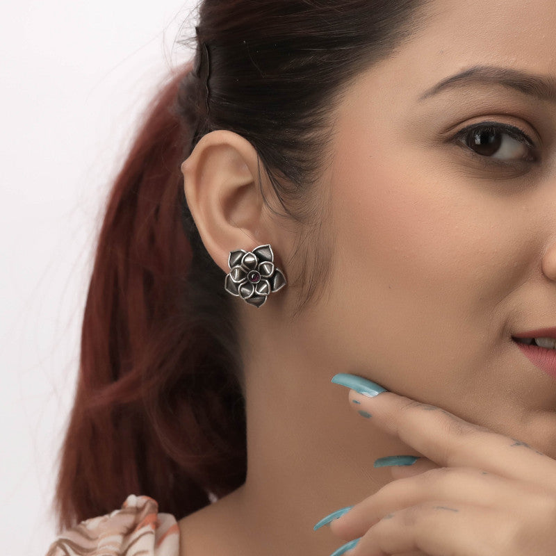 Elegant oxidized silver lotus leaf stud earrings on model – traditional ethnic jewelry for weddings and cultural events