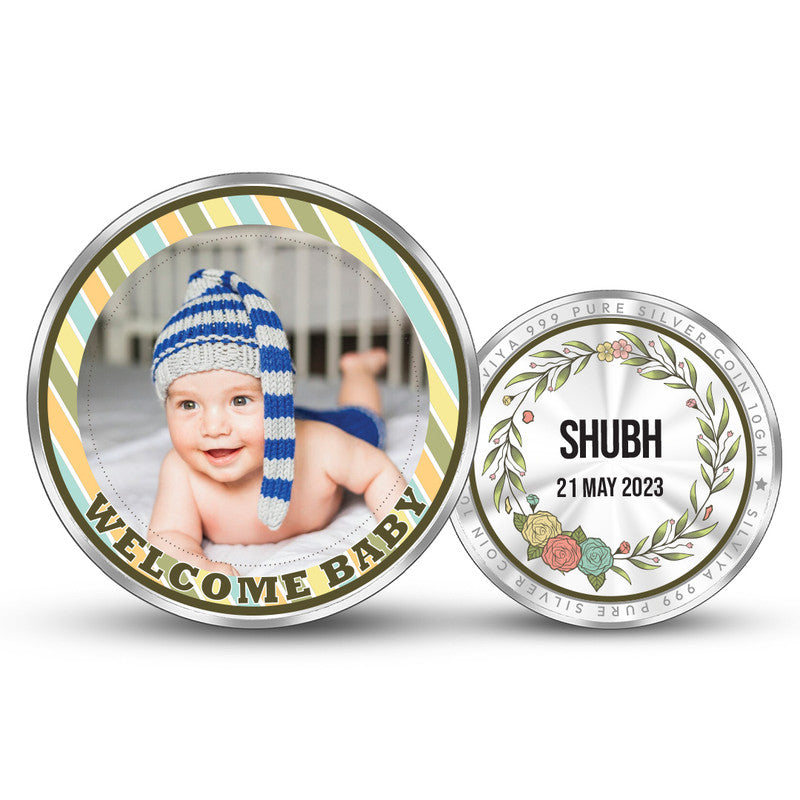 Front and backside of round 999 pure silver Welcome Baby keepsake coin.