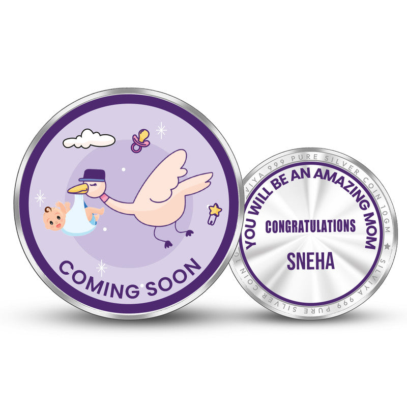 Front and backside of round 999 pure silver personalised baby shower coin.
