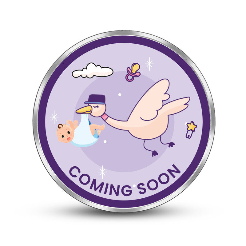 Round 999 silver coin with customised baby shower photo or design.