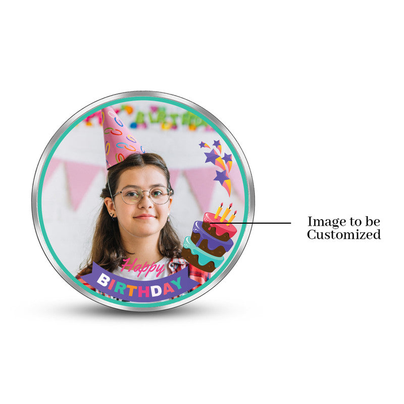 Round 999 silver coin with customised birthday star photo.