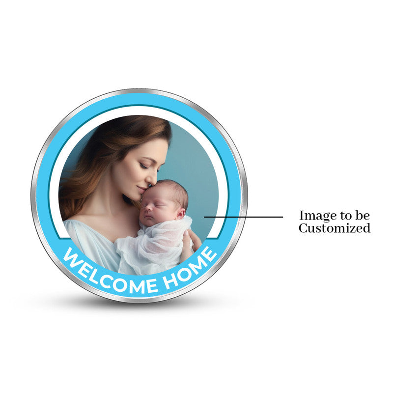 999 silver coin with customised Baby’s Arrival newborn photo.