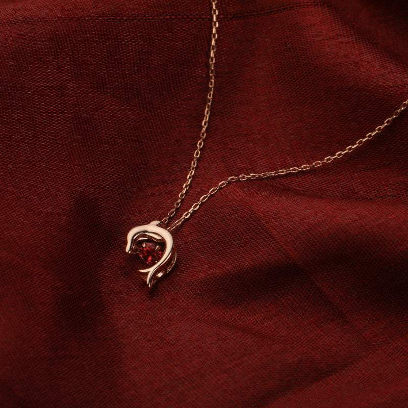 Detailed view of Rose Gold Dolphin Pendant Necklace – festive charm with silver and rose gold finish