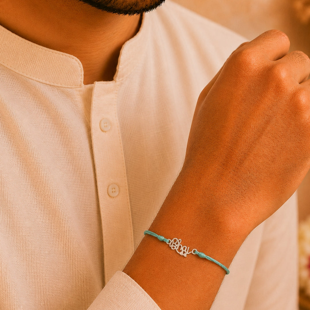 Brother Wearing Silver Bhai Letter Rakhi