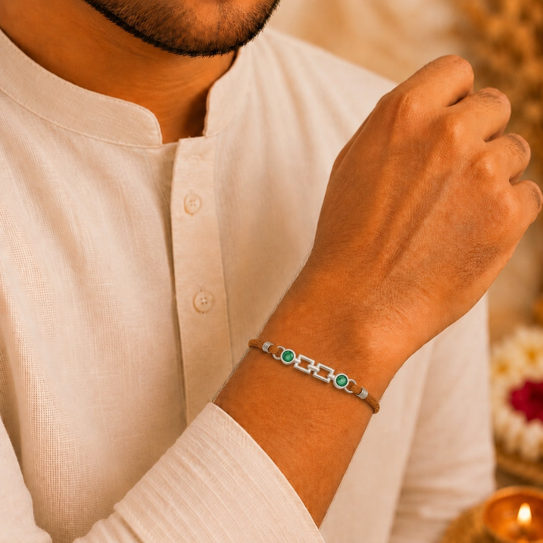 Brother wearing Silver Cubic Green Stone Rakhi by Silviya – 925 silver rakhi for Raksha Bandhan.