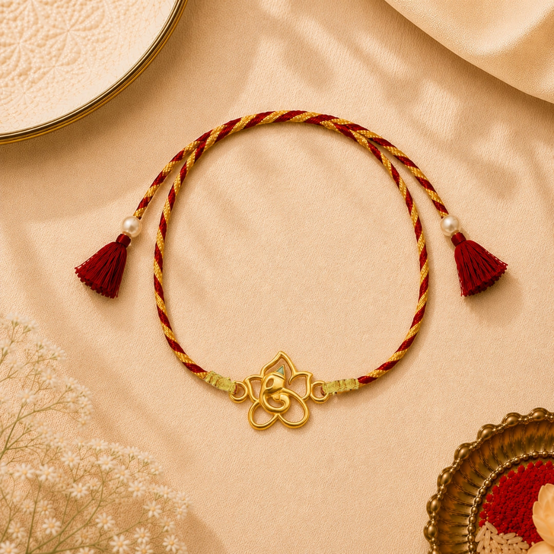 A pure silver Lord Ganesha in a flower rakhi, placed with roli and chawal – a divine Raksha Bandhan gift by Silviya.