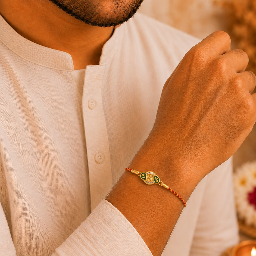 Brother wearing Silver Nakshatra Meena Art Rakhi by Silviya – 925 silver rakhi for Raksha Bandhan.
