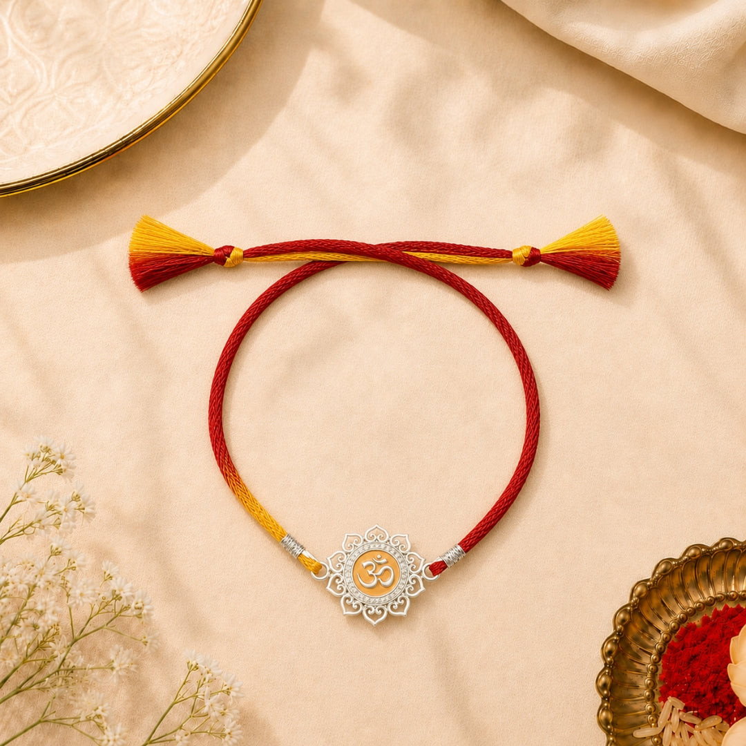 Silver Om Flower Rakhi placed with roli chawal and festive decor – premium 925 silver Raksha Bandhan gift by Silviya.