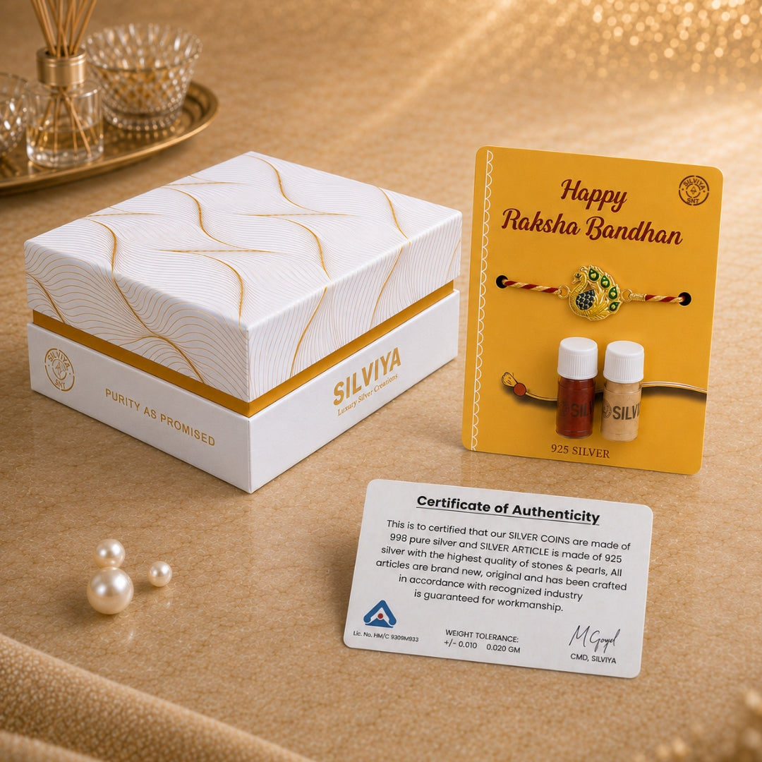 Premium Silviya gift box packaging for Silver Peacock Meena Art Rakhi – ideal 925 silver Raksha Bandhan gift for brother.