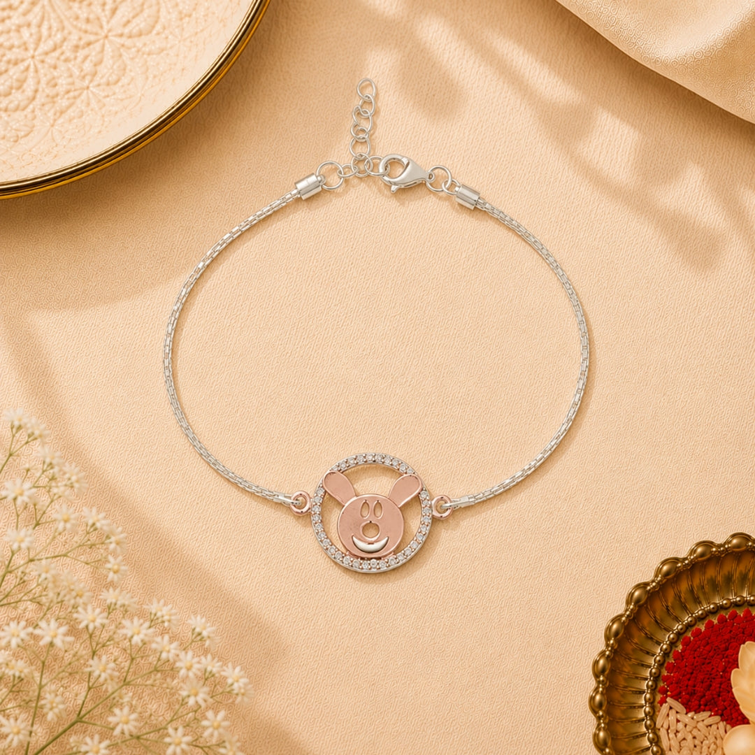 Silver Teddy Rakhi for Kids placed with roli chawal and festive decor – premium 925 silver kids Raksha Bandhan gift by Silviya.