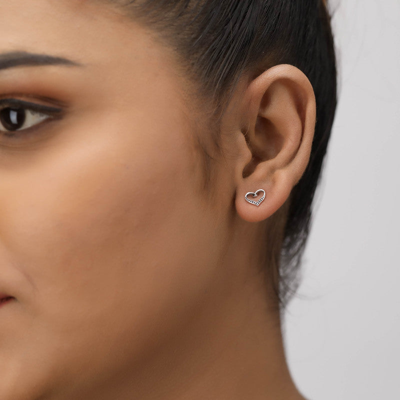 Girl wearing Sterling Silver Heart Stud Earrings – perfect Raksha Bandhan and festive gift for sisters and loved ones.