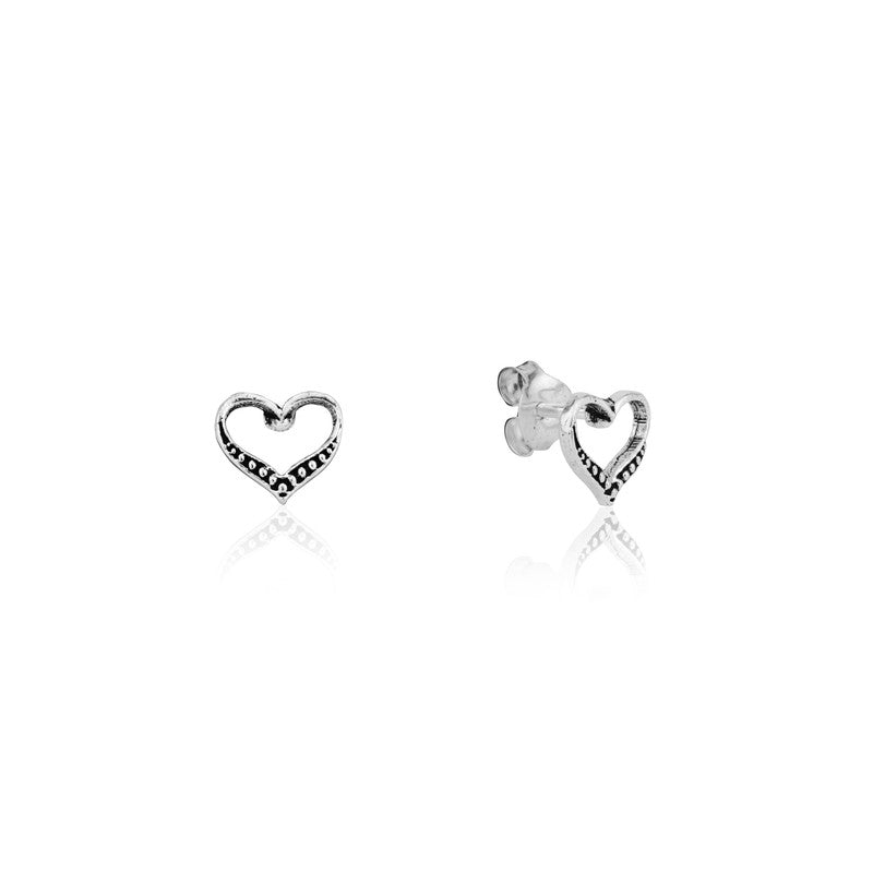 Sterling Silver Heart Stud Earrings close-up – trendy festive jewelry for women, ideal Diwali and wedding gift.