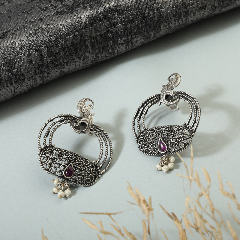 Vintage 925 Silver Earrings displayed as prop image on festive background – stylish silver earrings with fine detailing.