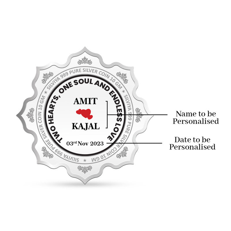 Back side of Mark the Moment lotus-shaped 999 pure silver coin with wedding message and heart icon.