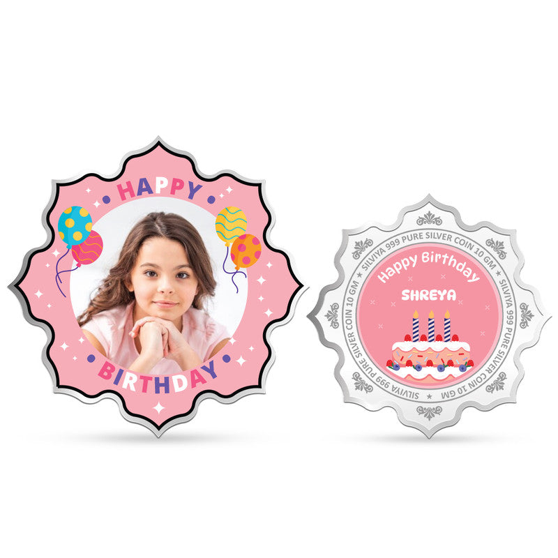 Front and backside of lotus-shaped 999 pure silver birthday memories coin.