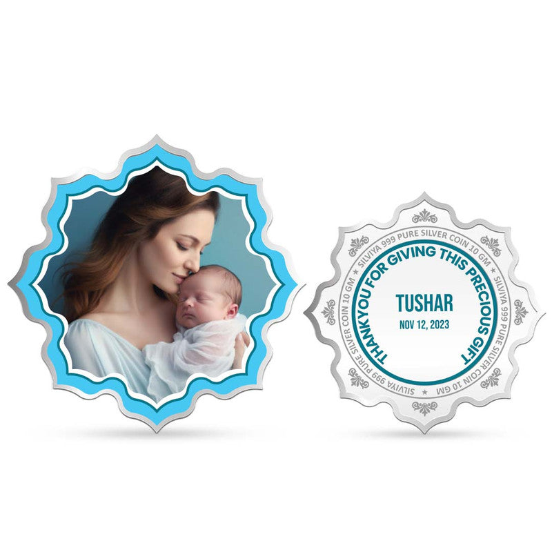 Front and backside of lotus-shaped 999 pure silver Baby’s Arrival customised coin.