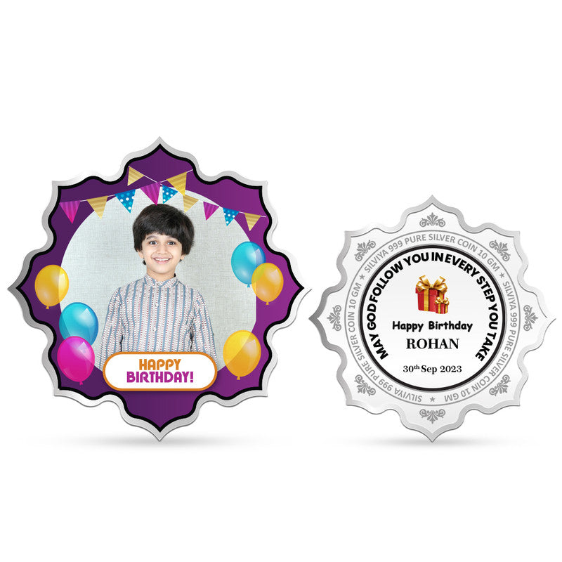 Front and backside of lotus-shaped 999 silver personalised birthday coin.