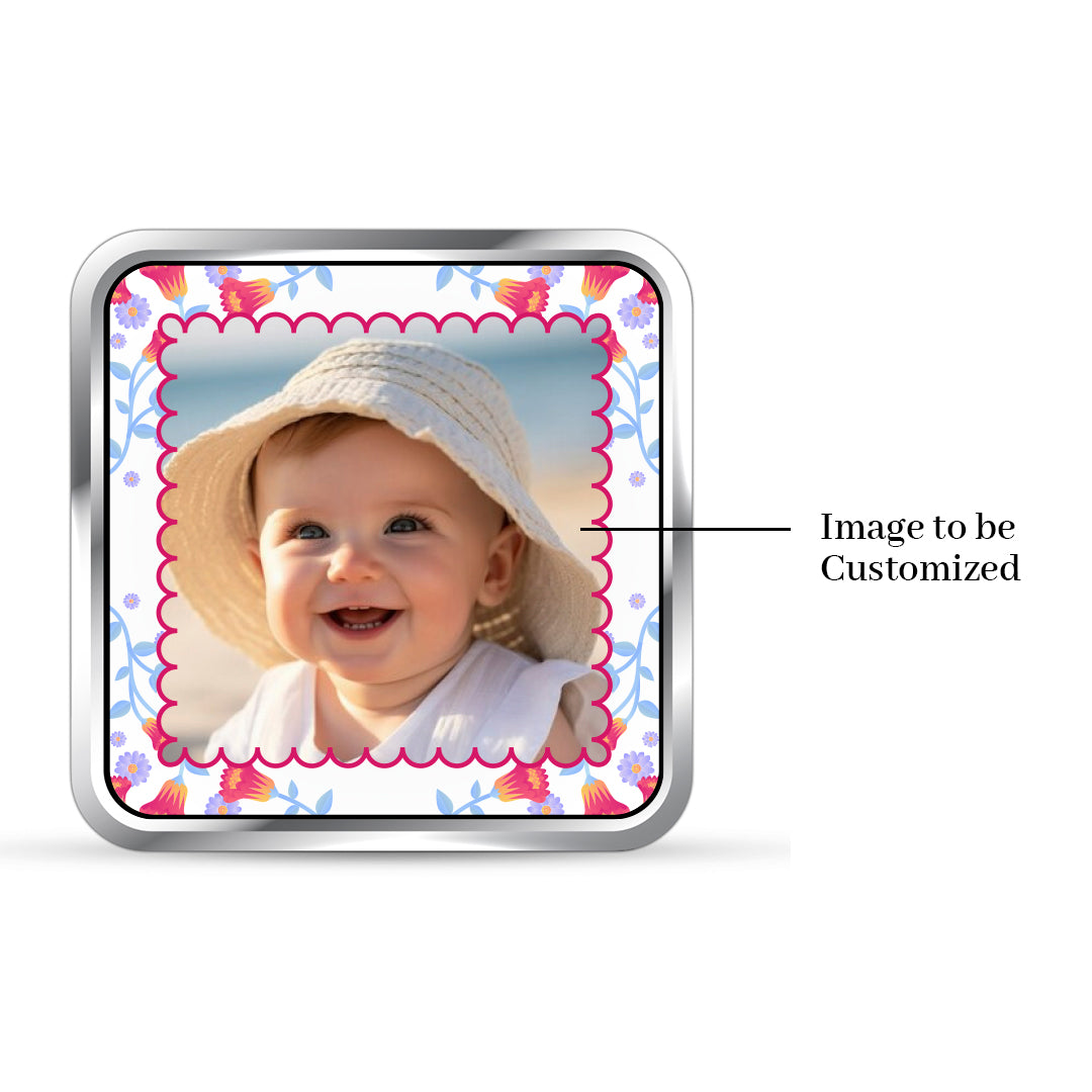 Square 999 silver coin with customised Celebrate New Life newborn photo.