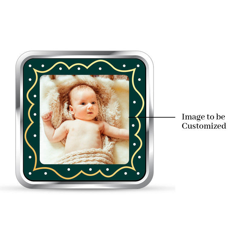 Backside view of square 999 pure silver baby boy keepsake coin with polished finish.