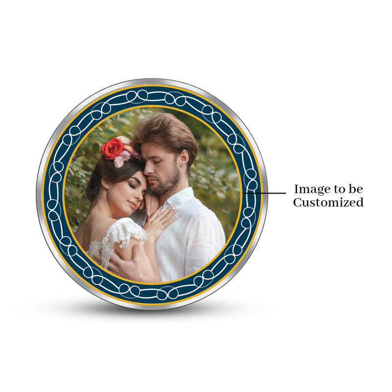 Round pure silver 999 personalized wedding coin featuring couple photo with green and blue decorative frame.
