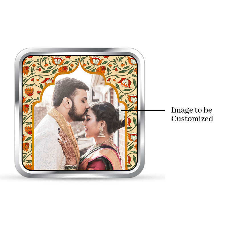 999 pure silver personalized wedding coin featuring couple photo in golden decorative square frame.