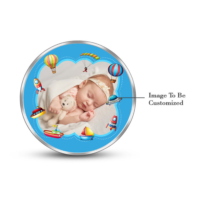 Round 999 silver coin featuring customised new born baby boy photo.