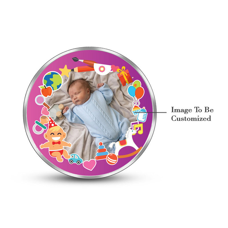 Round 999 silver coin with customised baby boy precious keepsake photo.
