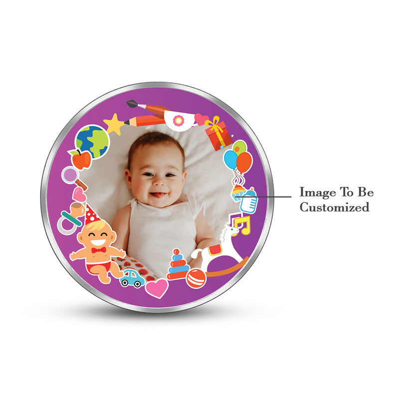 Round 999 silver coin with customised baby girl precious keepsake photo.