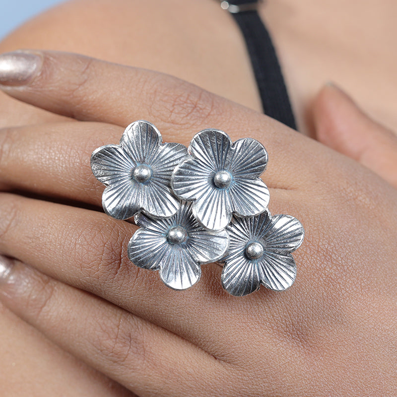 Woman wearing 925 Oxidised Four Petal Ring for Karwa Chauth and Navratri look