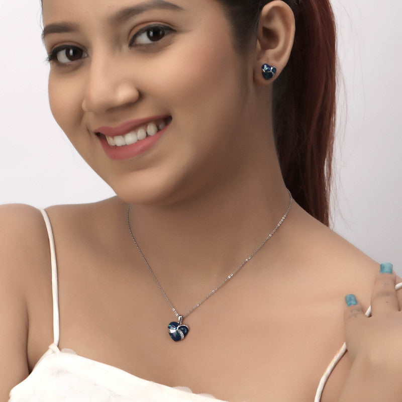 Woman wearing 925 silver blue heart pendant and earrings – stylish ethnic jewelry set
