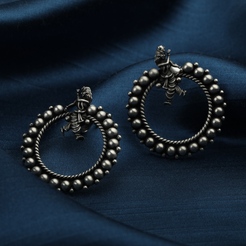 925 Silver Dancing Lady Hoop Earrings displayed as prop image on festive background – trendy silver earrings with fine detailing.