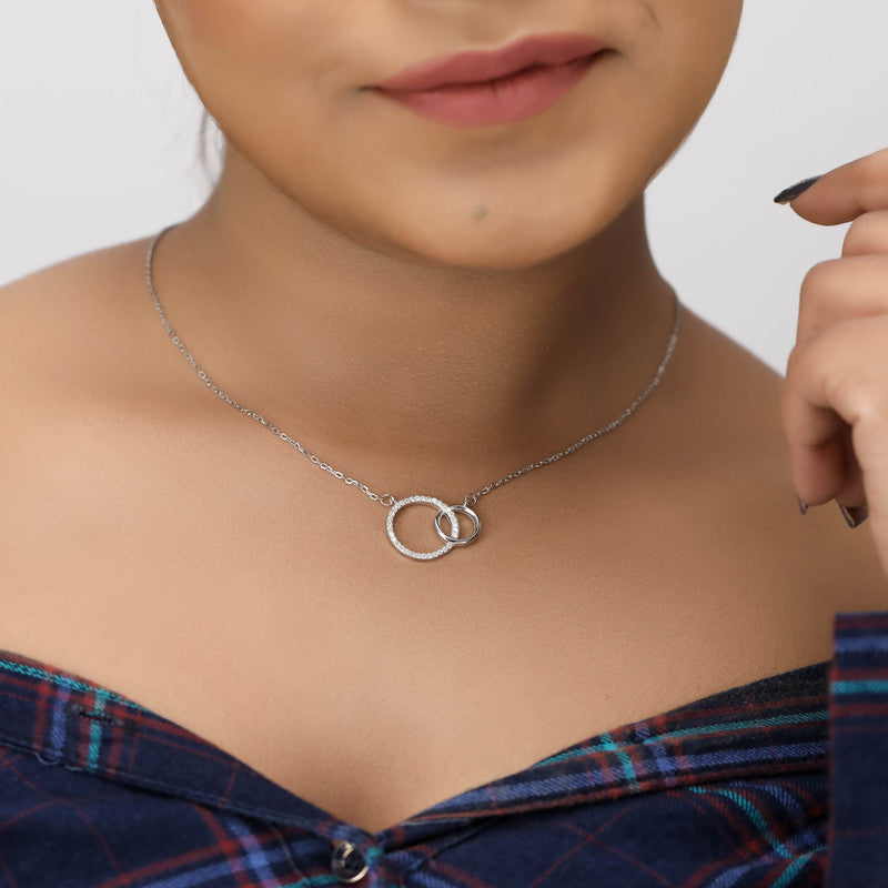 Festive styling with 925 Silver Double Ring Pendant – symbolic silver accessory representing love, unity, and forever bonds
