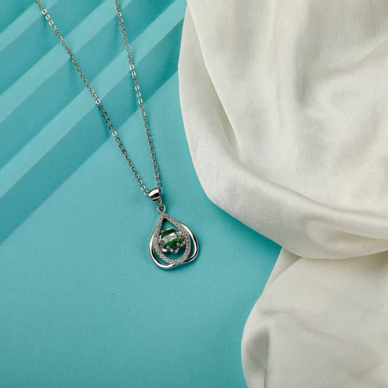 Stylish green emerald silver pendant perfect for festive occasions and puja wear
