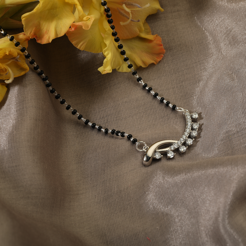 925 Silver Fascination Mangalsutra displayed on festive background – traditional silver jewellery with contemporary design.