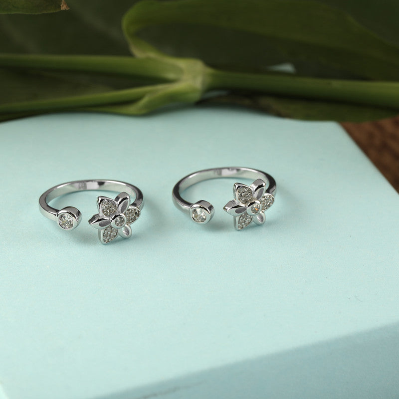 925 silver floral gemstone toe ring displayed with props – floral silver accessory with gemstone