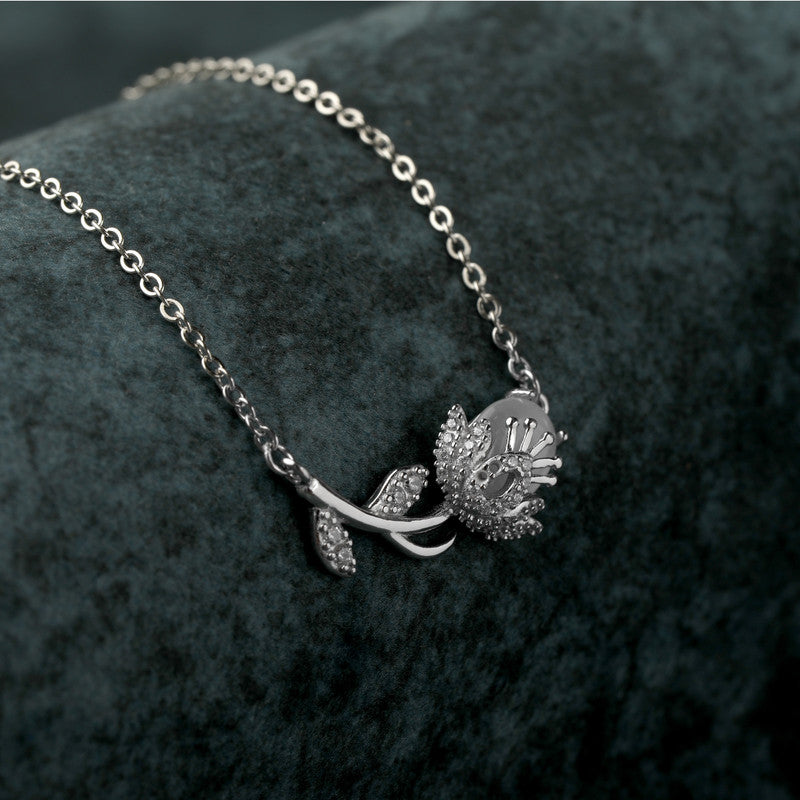 Stylish silver flower and branch design pendant perfect for festive occasions
