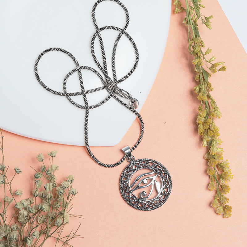Men’s 925 Sterling Silver Ganesha Eye Pendant with Detailed Spiritual Design displayed on surface
