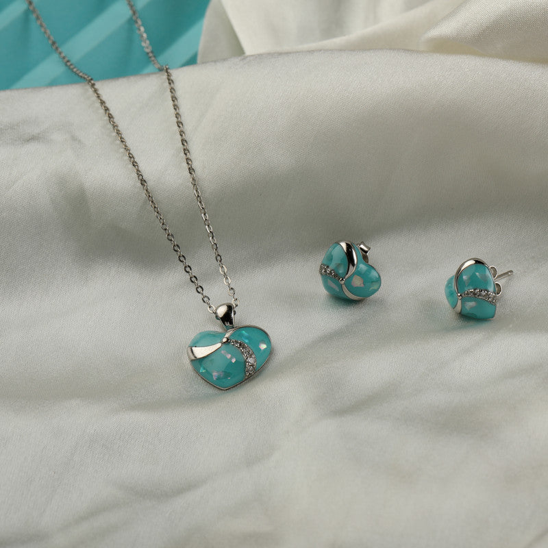 925 silver heart pendant and earrings displayed with props – romantic silver accessory set