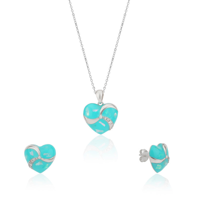 925 silver heart pendant and earrings photographed on plain white background