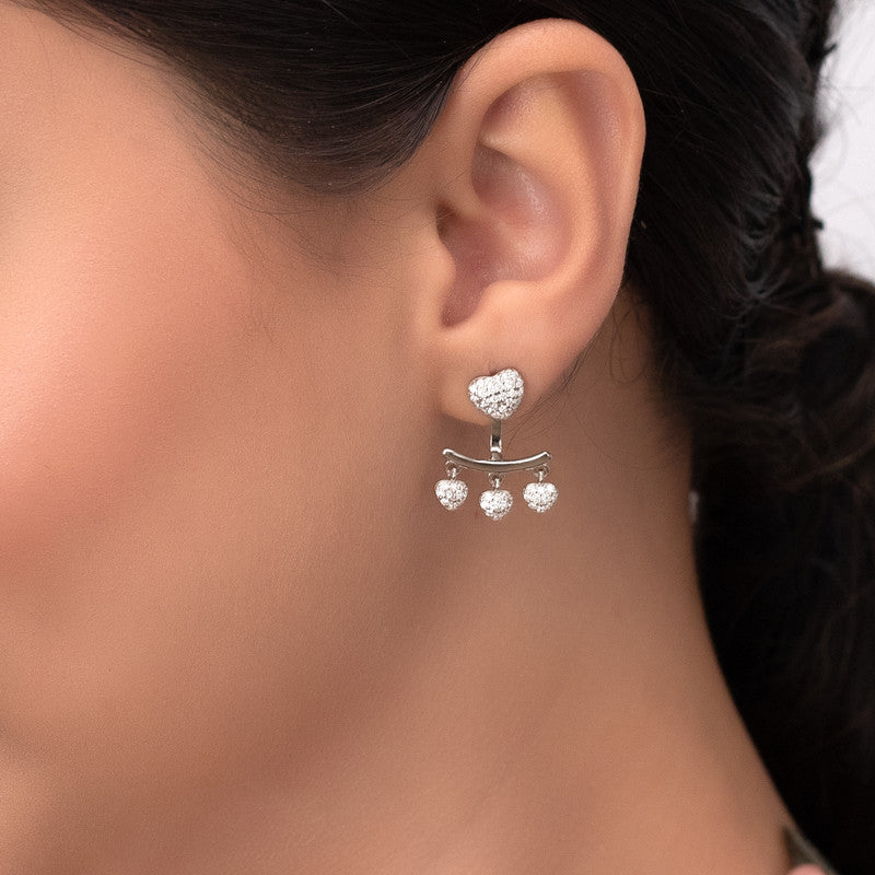 Girl wearing 925 Silver Heart Tassel Earrings – perfect Raksha Bandhan and festive gift for sisters and loved ones.