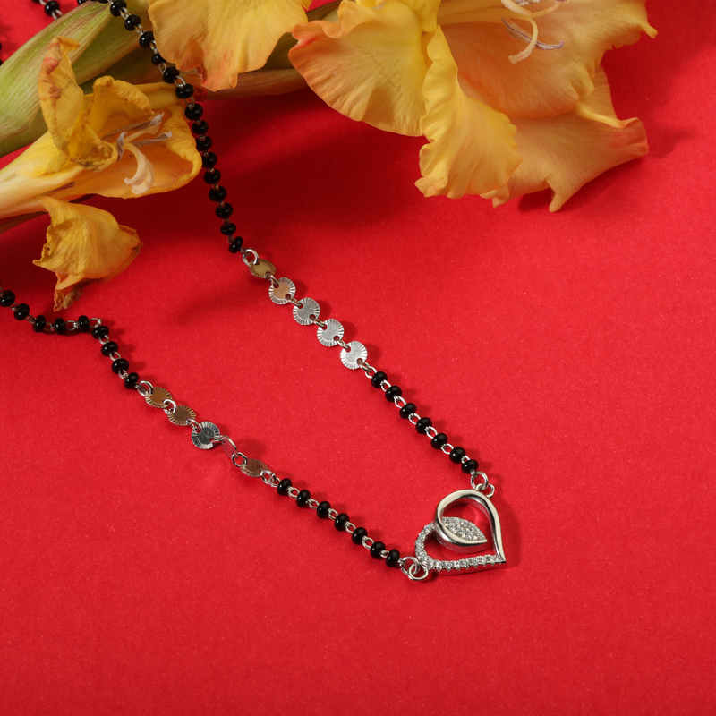 925 Silver Loves Infinite Mangalsutra displayed on red festive background – modern silver mangalsutra jewelry.
