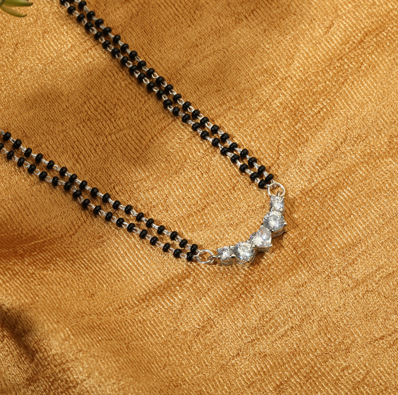 925 Silver Matrimony Mangalsutra displayed on festive background – traditional silver jewellery with graceful design.