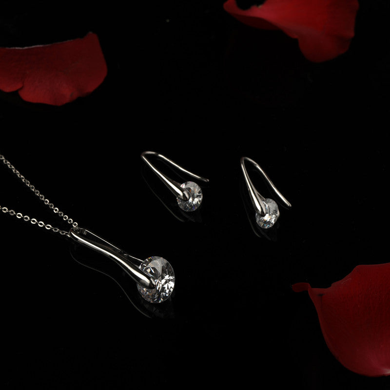 925 silver quartz wand pendant set displayed with props – crystal silver accessory