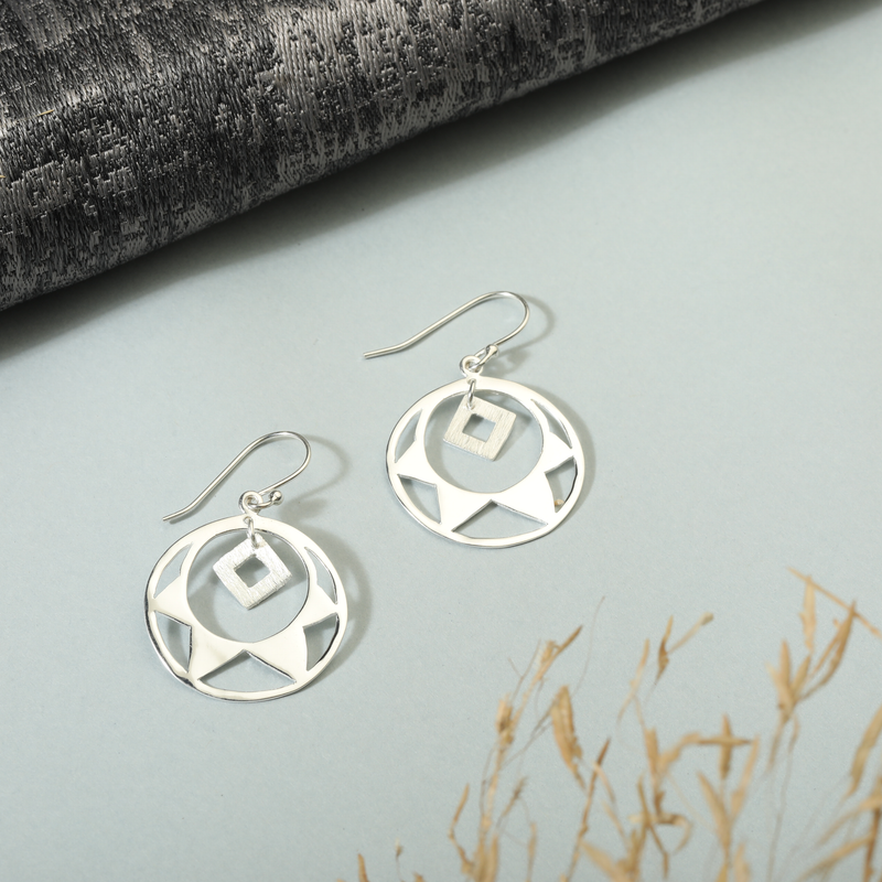 925 Silver Radiant Rounds Earrings displayed as prop image on festive background – stylish silver earrings with fine detailing.