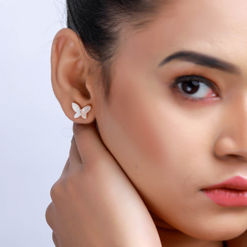 Model styling Rose Gold Butterfly Earrings – Navratri accessory for graceful ethnic looks